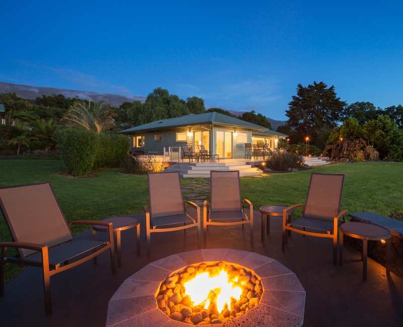 chairs sitting around fire pit on patio