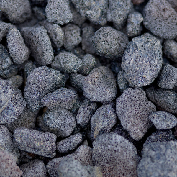 Dark grey volcanic rocks.